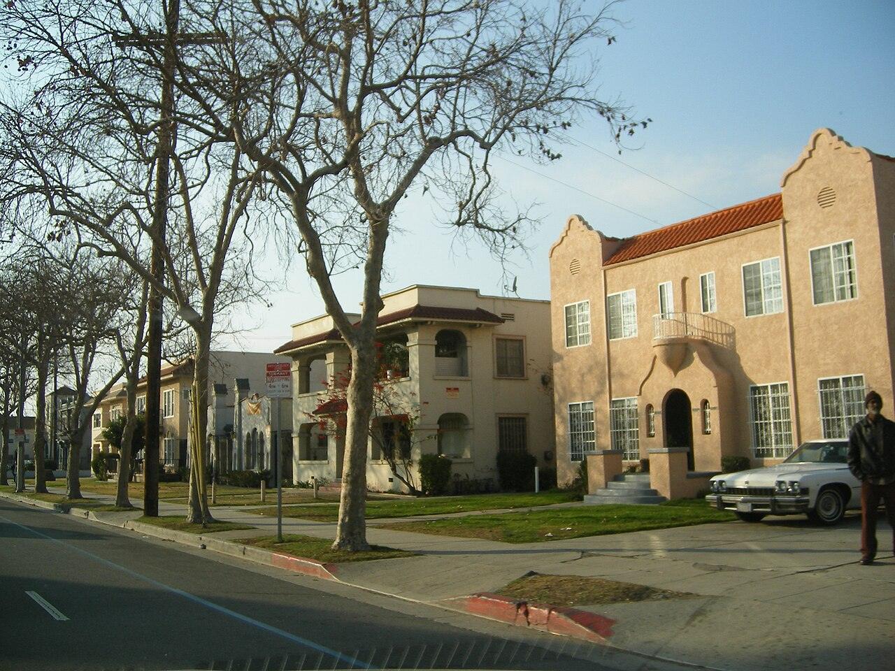 Spanish style homes along a tree-lined street in Leimert Park